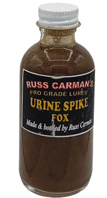 A small bottle labeled "Carman's Pro Grade Urine Spike Fox," with a metal cap.