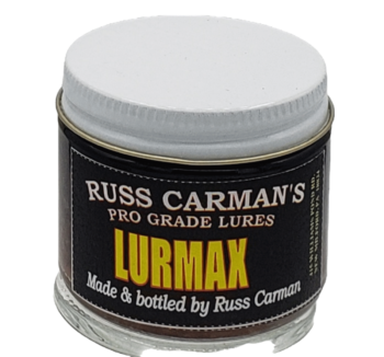 Jar of Carman's Pro Grade Lurmax, a perfect coyote lure, with a white lid and glass container.