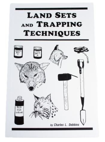 Cover of "Charles Dobbins - Land Sets and Trapping Techniques," with animal illustrations, coon trapping, and gear.