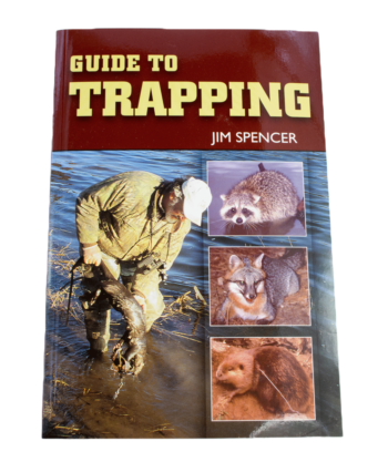 Cover of "Jim Spencer - Guide To Trapping" featuring someone with a trapped animal and wildlife images.