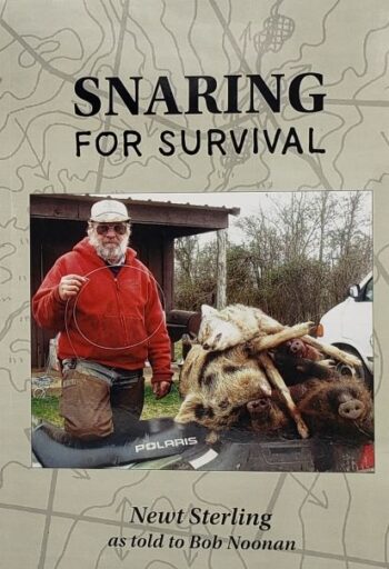 Man with snare beside boars on Polaris ATV. Text: "Snaring For Survival" book by Newt Sterling.