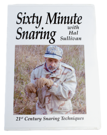 Man in camo jacket readies snare on "Hal Sullivan - Sixty Minute Snaring" book cover.