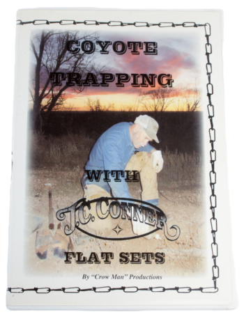 Cover of "J.C Conner - Coyote Trapping with Flat Sets," depicts setting a trap outdoors against a sunset and barren trees.