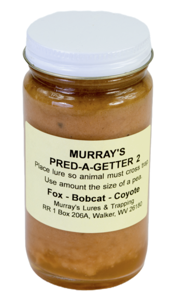 Jar of Murray's Pred-A-Getter #2 Lure, ideal for trapping bobcats, foxes, and coyotes; includes contact info on label.