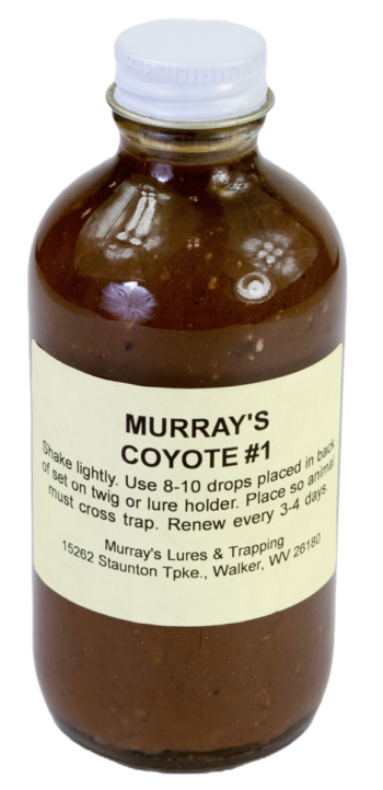 Murray's Coyote #1 Lure bottle includes trapping instructions and address details on the label.