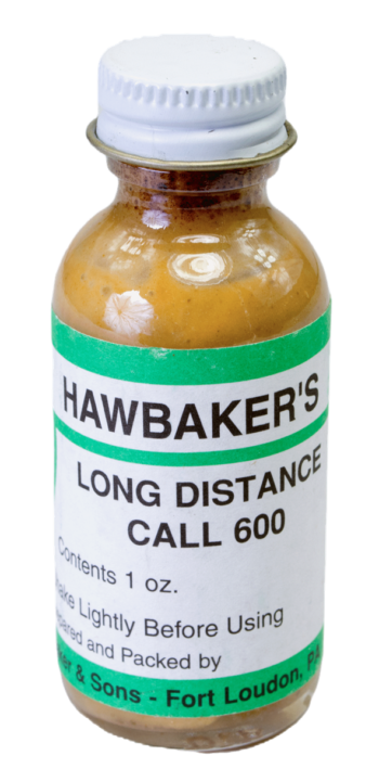 A 1 oz glass bottle of Hawbaker's Long Distance Call Lure 600, with a metal screw cap.