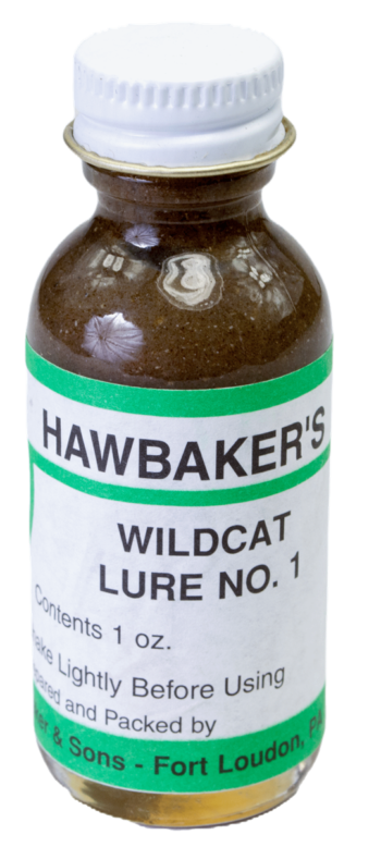 A 1 oz brown bottle labeled "Hawbaker's Wildcat Lure No. 1," ideal for bobcat trapping, with green accents and instructions.