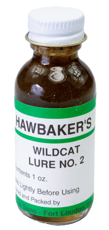 A 1 oz brown bottle labeled "Hawbaker's Wildcat Lure No. 2," with white and green text, perfect for trapping lure.