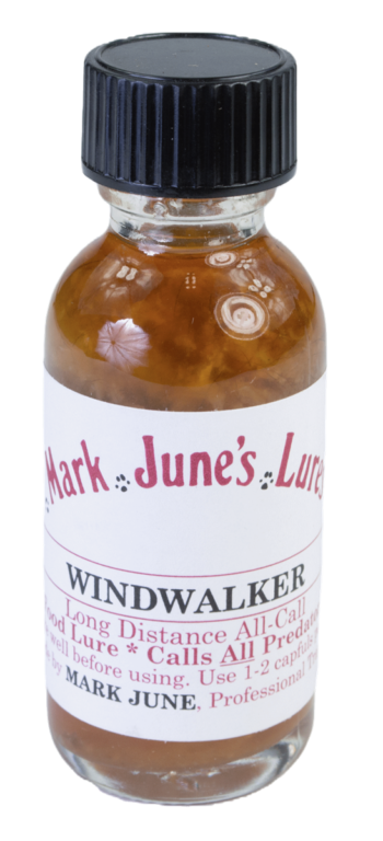 A small "Mark June's Windwalker Lure" bottle with a dark cap, containing brown trapping lure liquid.