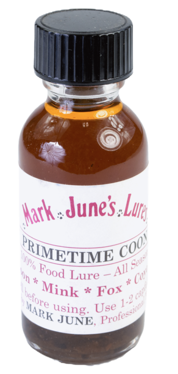 A bottle labeled "Mark June's Primetime Coon Lure" is used for trapping mink, fox, and coyotes.