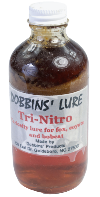 A bottle of Dobbins' Tri-Nitro Lure is great for attracting foxes, coyotes, and bobcats as a curiosity lure.