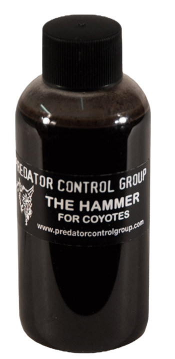 Black bottle labeled PCG "The Hammer" Coyote Lure 4 oz., part of the Predator Control Group.