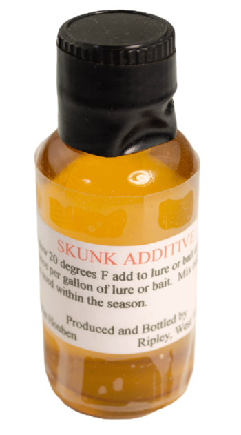 Clear bottle with yellow liquid labeled "Houben's Skunk Additive," includes skunk essence and instructions.