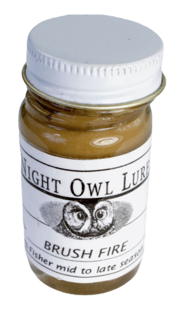 A small glass jar labeled "Night Owl Brush Fire Lure" with an owl design, perfect for night trapping.