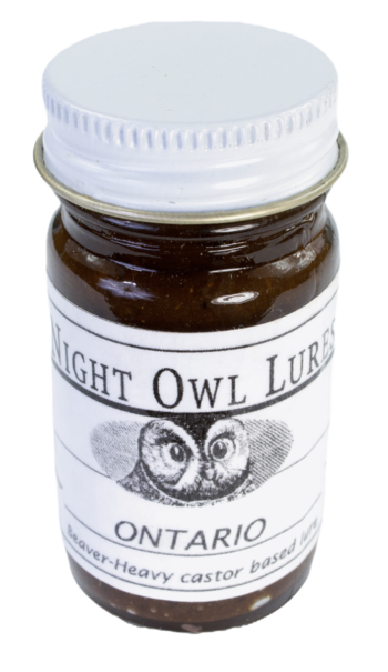 A small jar of "Night Owl Ontario Lure" with an owl graphic, featuring a beaver-heavy trapping formula.