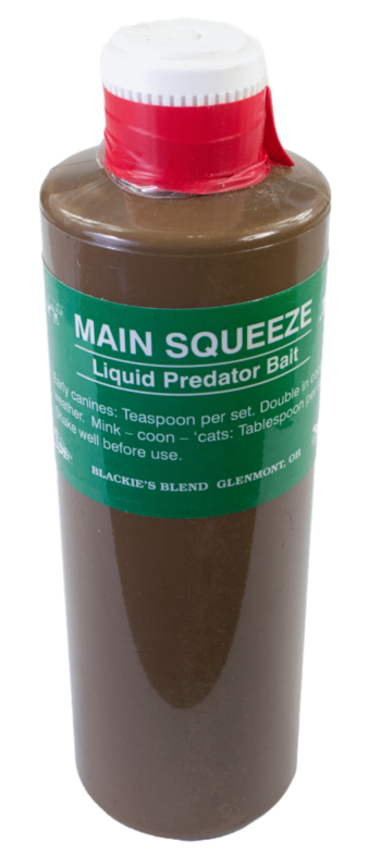 A "Blackie's Main Squeeze Bait" bottle with a red cap and detailed usage instructions printed on the container.