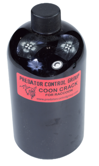 A black bottle with a red label reads "PCG Coon Crack Bait"—the perfect raccoon bait.