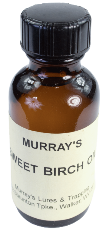 Brown glass bottle labeled "Murray's Sweet Birch Oil," featuring a black cap with details on its origin and company.