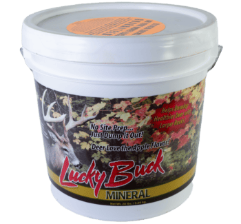 White "Lucky Buck Mineral" bucket with deer and autumn leaves design, marketed as a deer attractor.