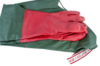 Polar Paws 31-Inch Gauntlet placed on a folded green apron with a white strap.