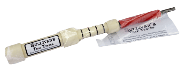 A Sullivans Trap Pan Tester with a white handle, red tip, and plastic wrap to measure trap pan tension.