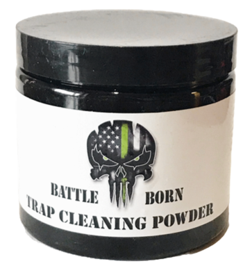 White container, black lid labeled "Battle Born Trap Cleaner by Southern Snares," with skull & American flag design.